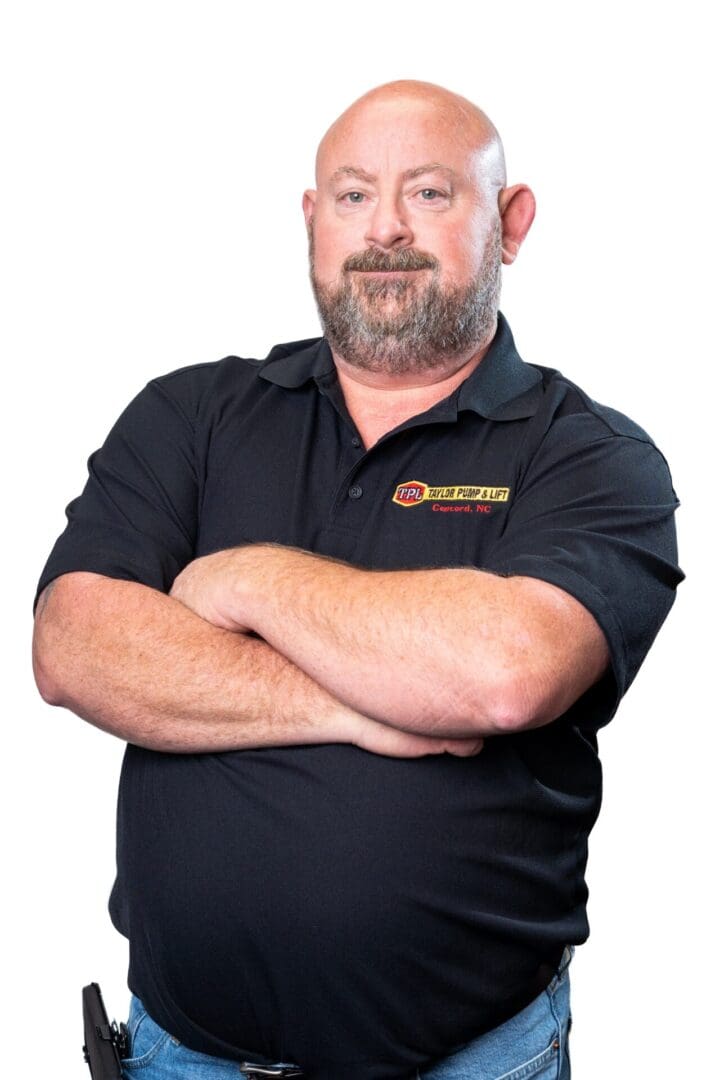 A man with his arms crossed wearing a black shirt.