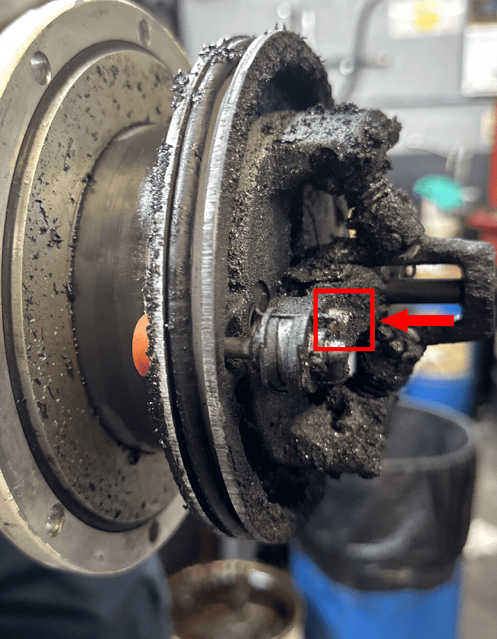 Close up view of damaged pump poppet top