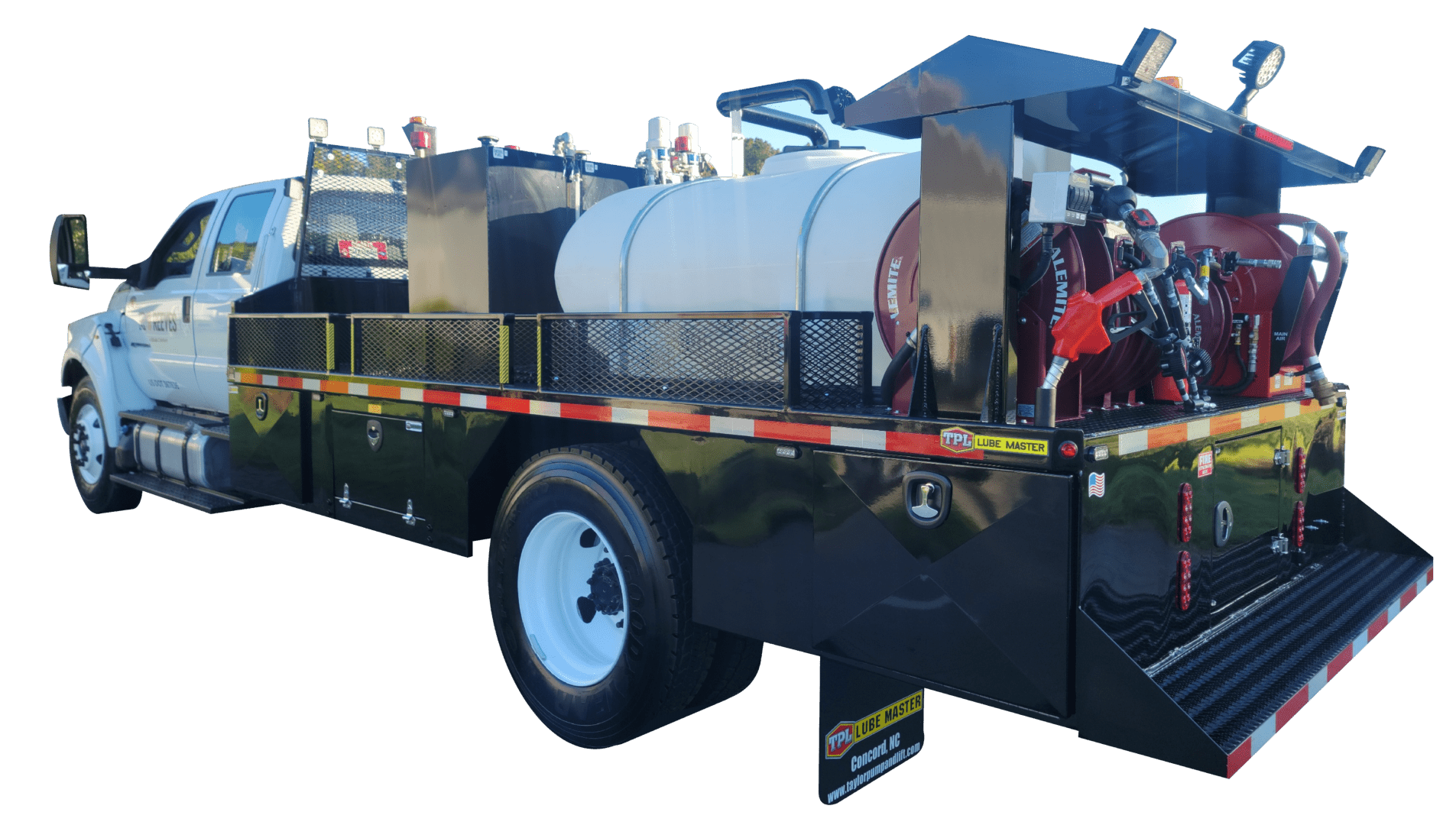 A black flatbed truck with a white tank on the back.