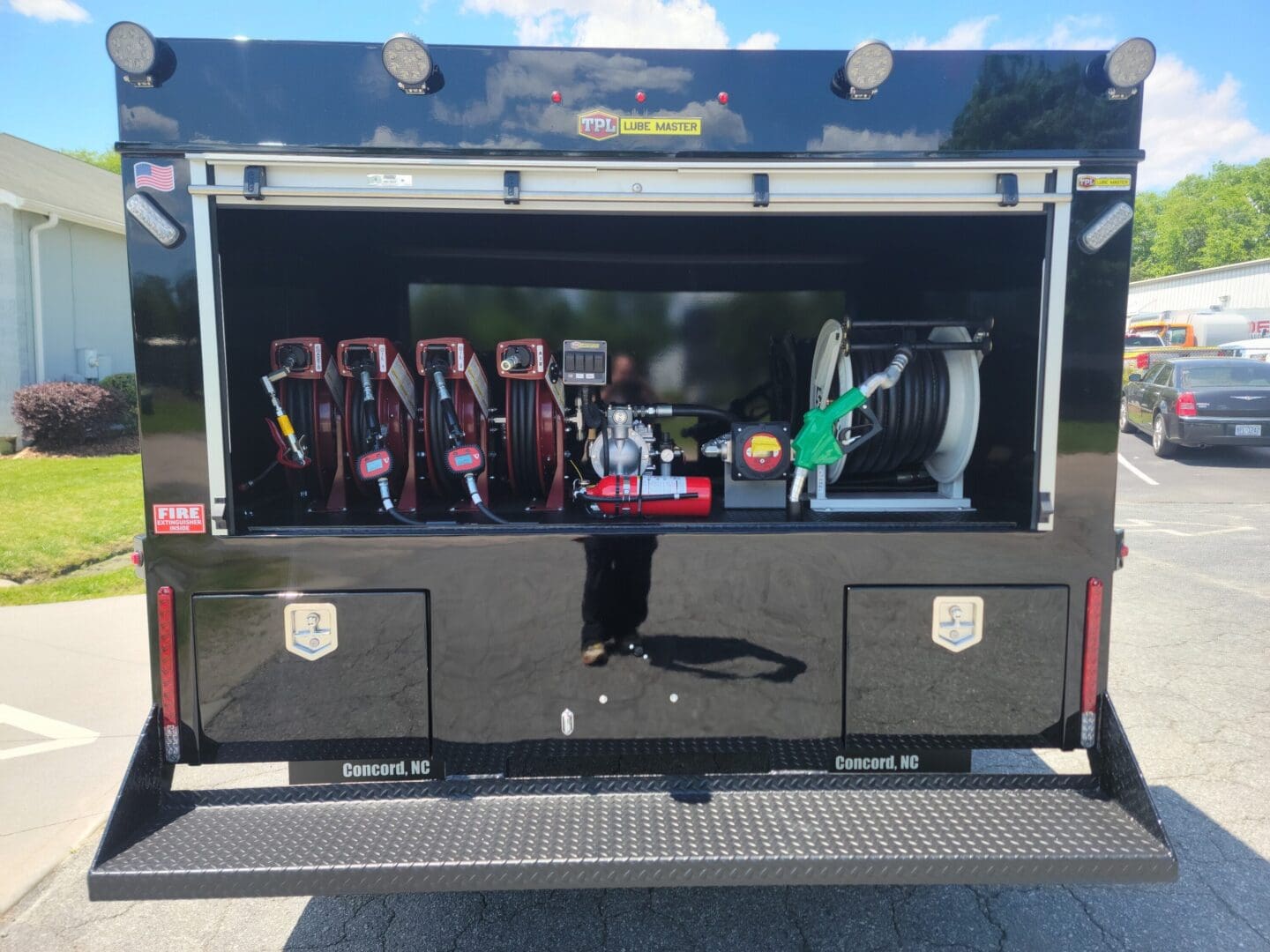 A truck with a large trunk and two drawers.