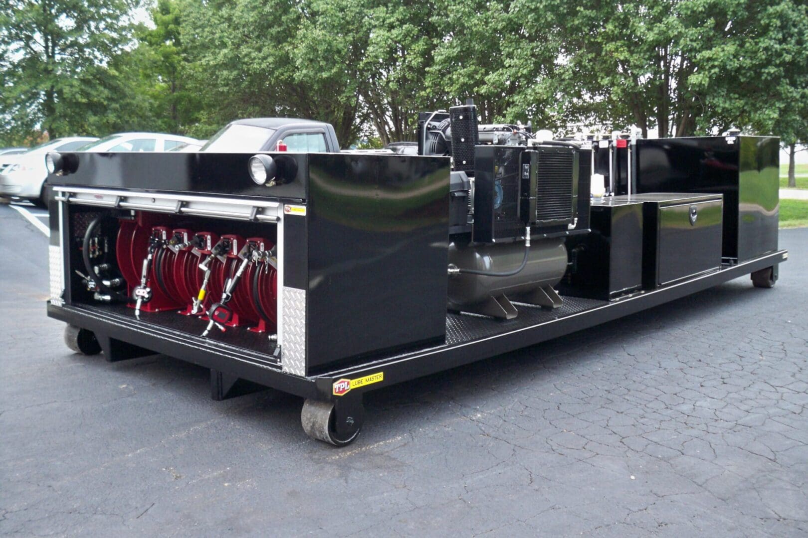 A black cart with many items on it