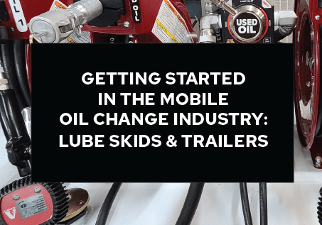 A picture of some oil change equipment and a hose.